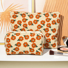 SOIDRAM floral makeup bag set on vanity displaying cosmetics