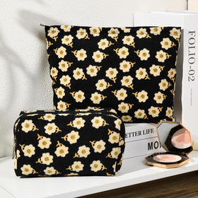 SOIDRAM large cosmetic bag measuring 11x6 inches in black floral pattern