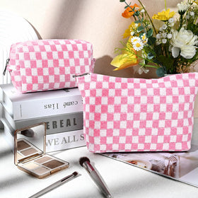 SOIDRAM large pink checkered cosmetic bag open with items inside