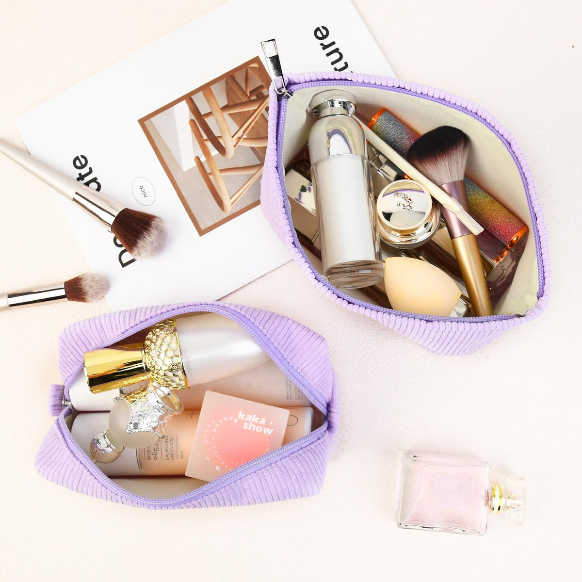 SOIDRAM makeup bags displayed on a travel suitcase
