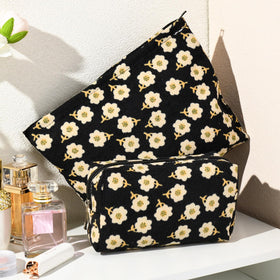 SOIDRAM makeup bags displayed on a vanity with cosmetics