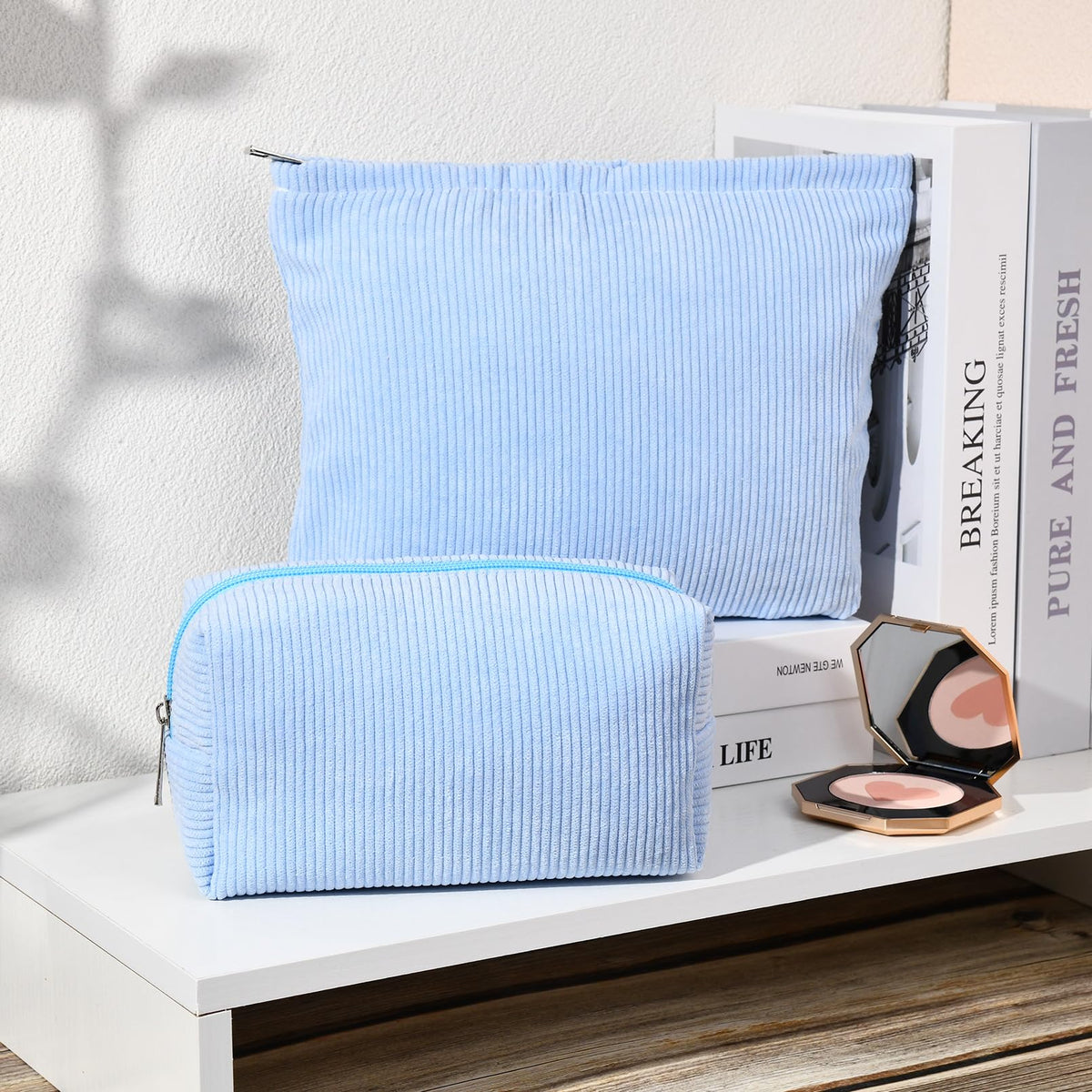 SOIDRAM makeup bags stacked for storage
