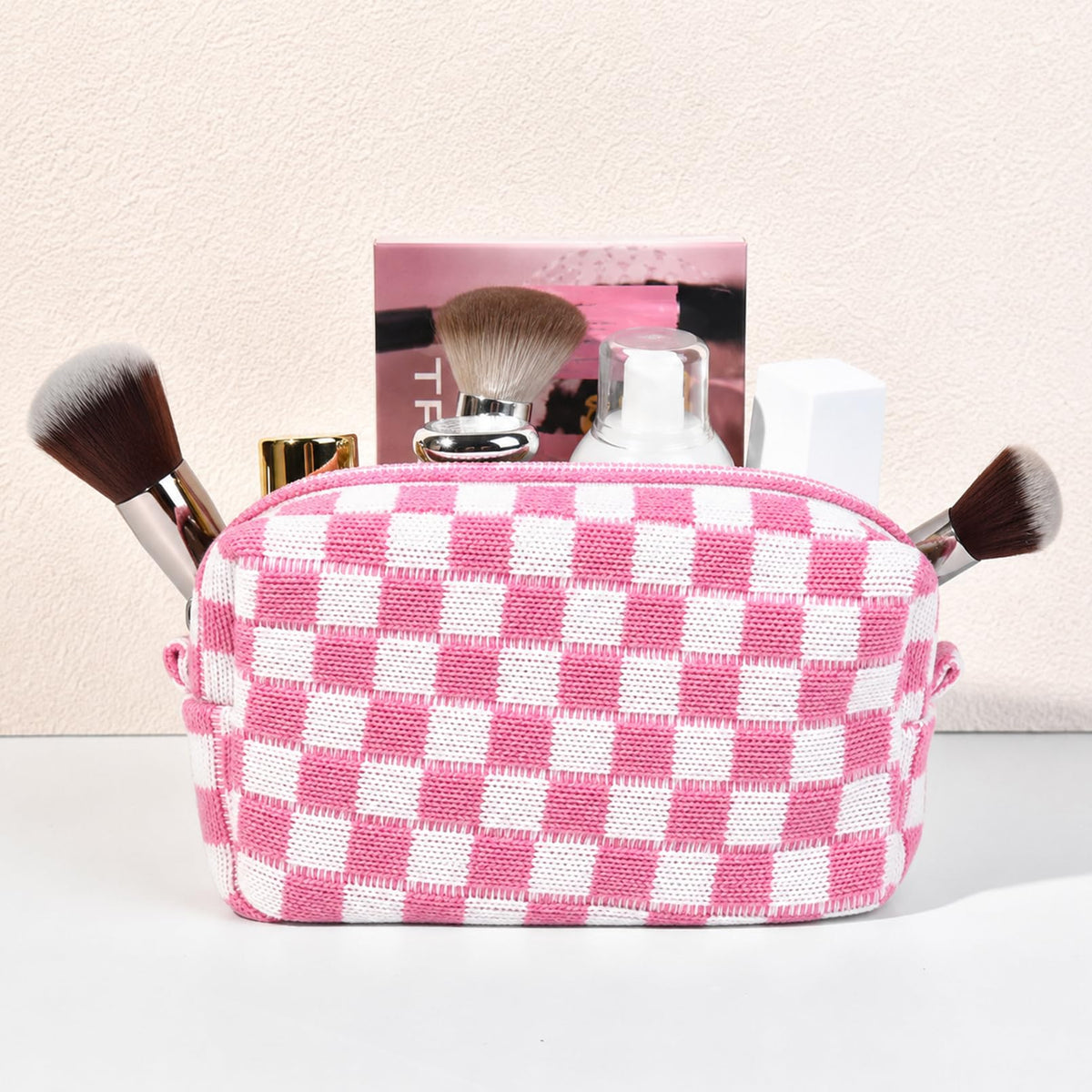 SOIDRAM pink checkered makeup bag with toiletries