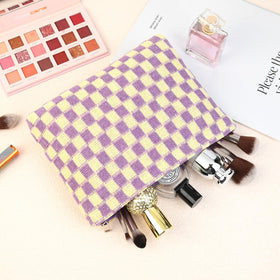 SOIDRAM purple checkered makeup bag with toiletries inside