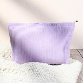SOIDRAM purple cosmetic bags stacked together