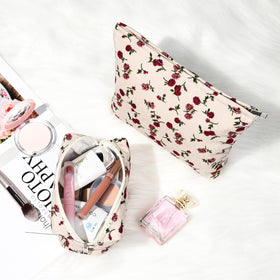 SOIDRAM Rose Makeup Bag Set displayed with cosmetics