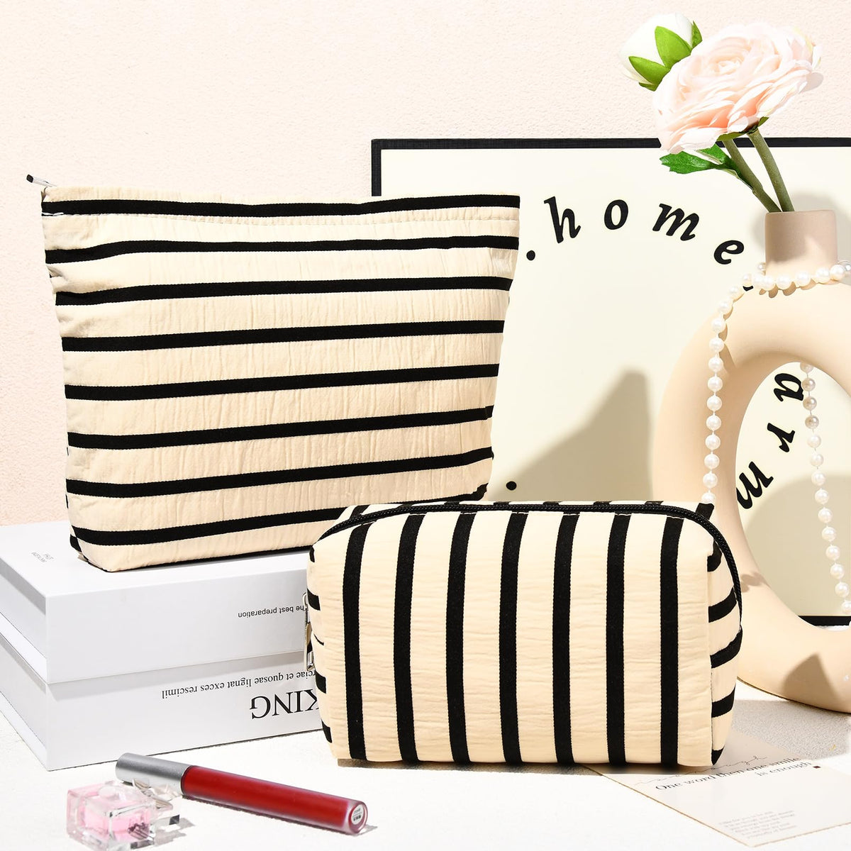 SOIDRAM stripe makeup bags stacked together
