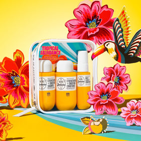 Sol de Janeiro Tropical Abundance Hair Repair Trio displayed on a bathroom counter