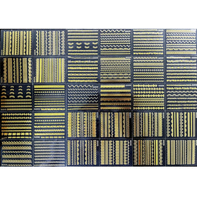 SPLOCUDU gold line nail stickers displayed on a table