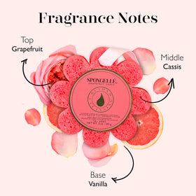 SPONGELLÉ Grapefruit Cassis Bath Sponge in use under warm water