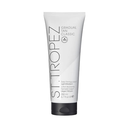 St.Tropez Gradual Tan Firming Lotion front view with packaging