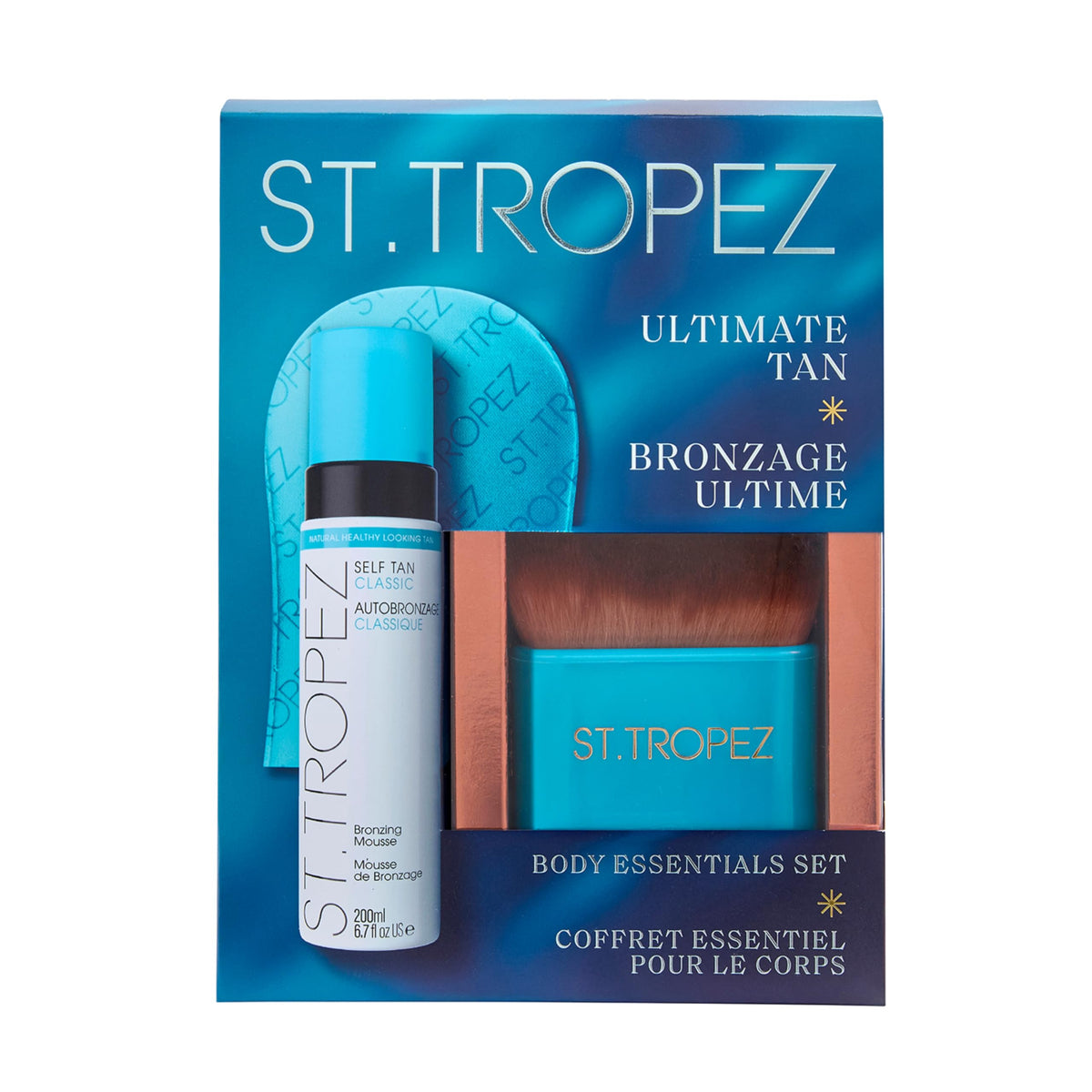 St.Tropez tanning mitt and brush on a vanity