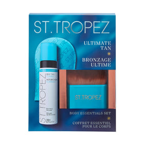 St.Tropez tanning mitt and brush on a vanity