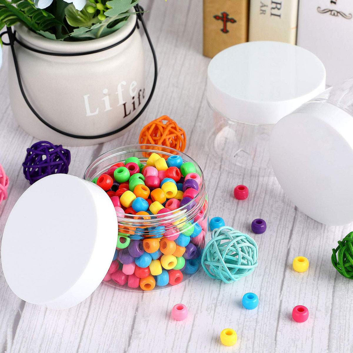 Stacked Patelai plastic jars showing transparent design