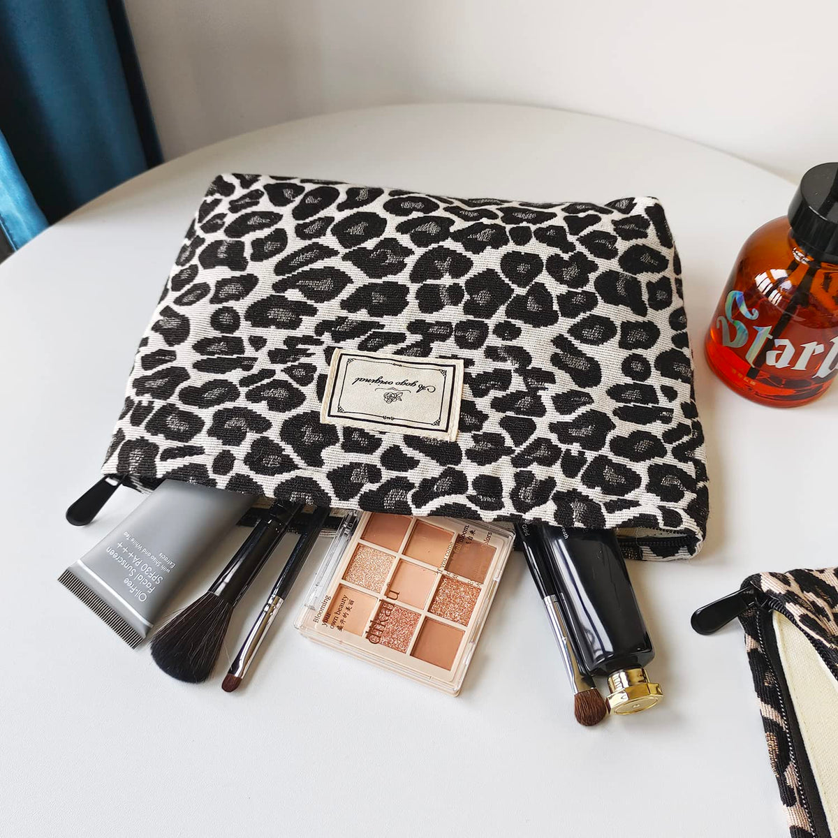 STARDW Leopard Makeup Bag Organizer side view showcasing fabric