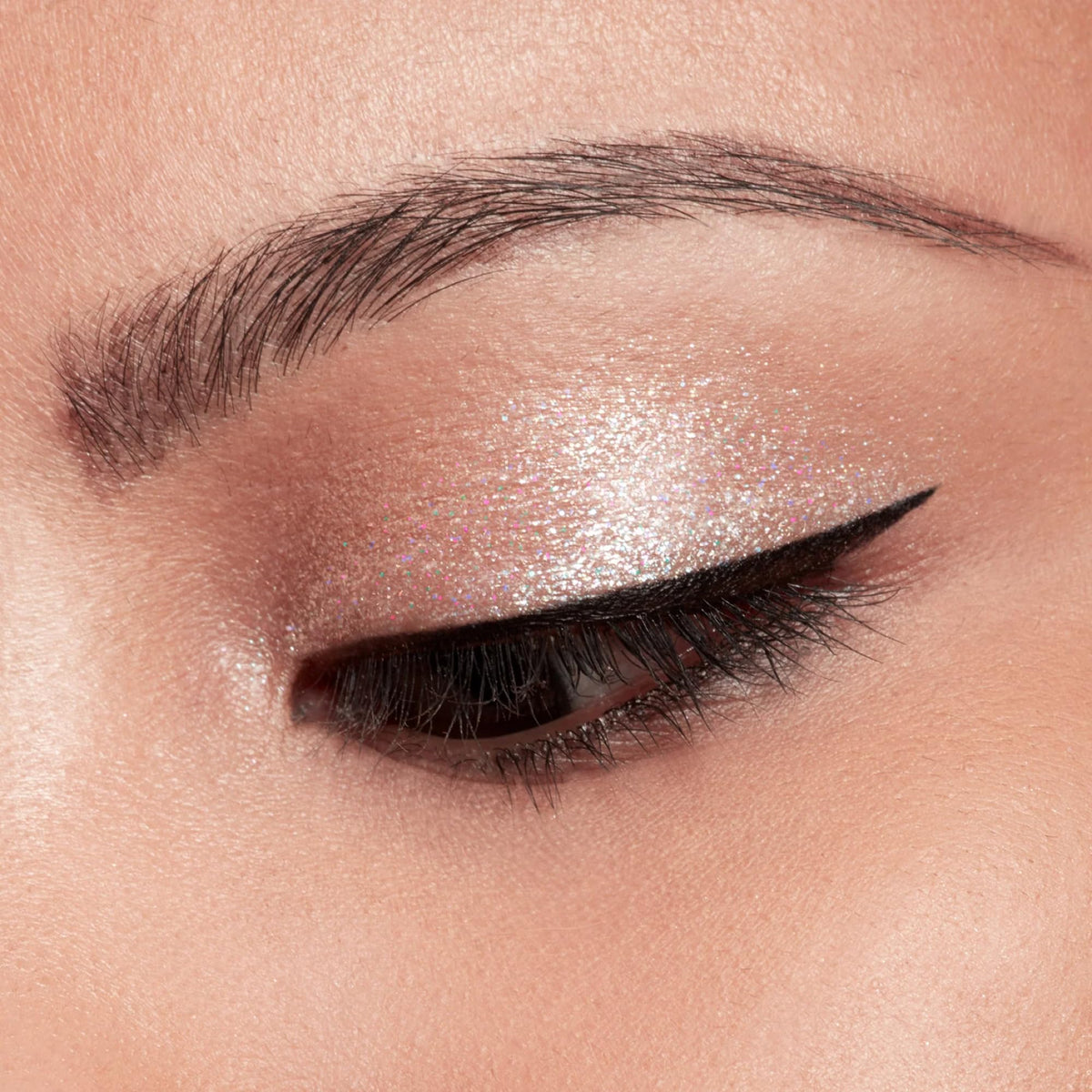 Stila Glitter and Glow Liquid Eye Shadow in use on model's eyes