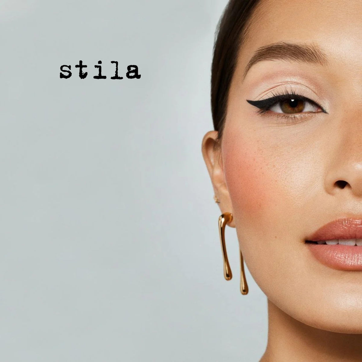 stila Stay All Day Waterproof Liquid Eye Liner with makeup brush