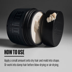 STMNT Matte Paste 3.38 oz lifestyle shot on grooming table