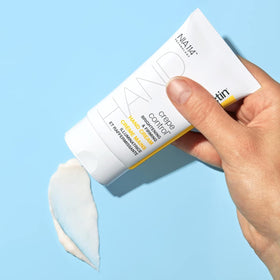 StriVectin Crepe Control® hand cream on a wooden surface