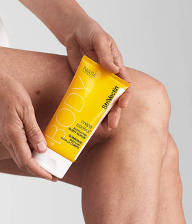 StriVectin Tighten & Lift Exfoliating Body Scrub being applied to skin