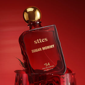 Sttes Sugar Mommy #54 on a vanity with flowers