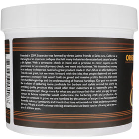 Suavecito Pomade in a grooming kit setup