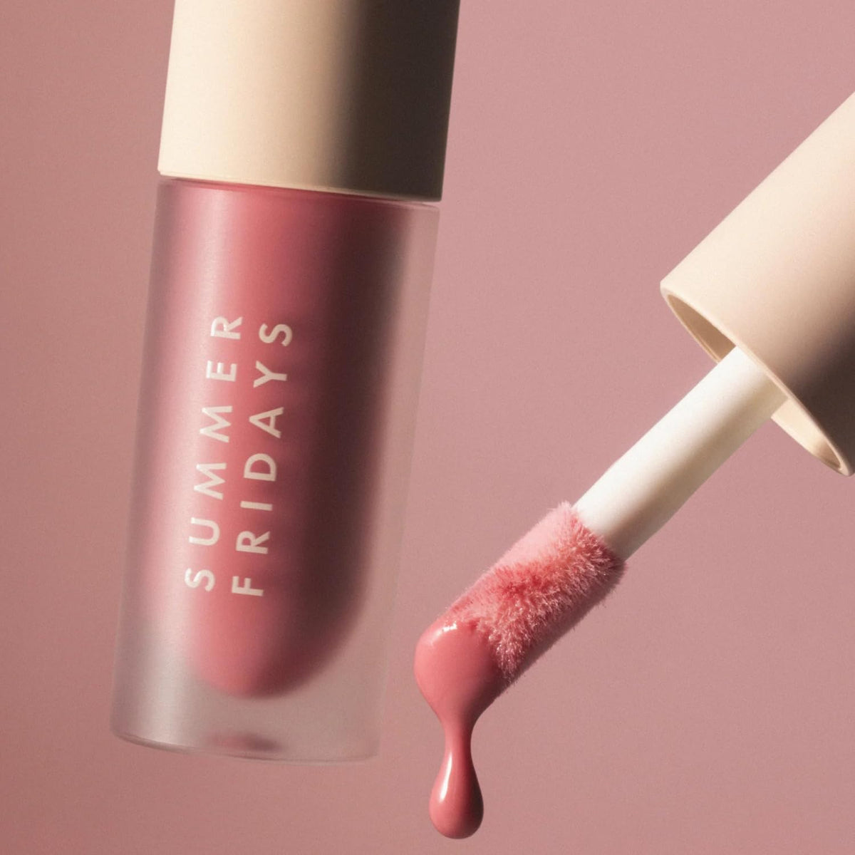 Summer Fridays Dream Lip Oil layered over lipstick