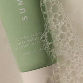 Summer Fridays Super Amino Gel Facial Cleanser lifestyle scene on bathroom counter