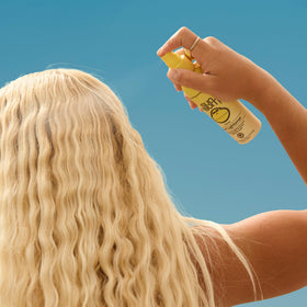 Sun Bum Hair Lightener Spray 4 oz side view showing nozzle