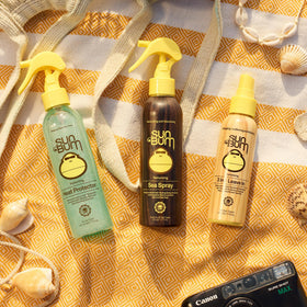 Sun Bum Sea Spray 6 oz lifestyle scene on beach