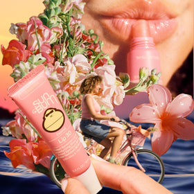 Sun Bum SPF 30 Coconut Sunscreen Lip Balm Sunset Cove Tinted with coconut background