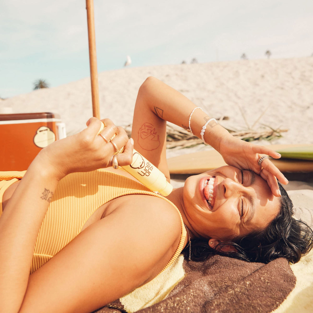 Sun Bum SPF 45 Sunscreen Mist in outdoor setting