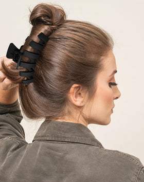 Sunolga Flower Claw Clip in use during yoga
