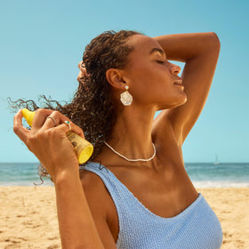 SunSun Revitalizing 3-in-1 Detangler Leave In Conditioner side view