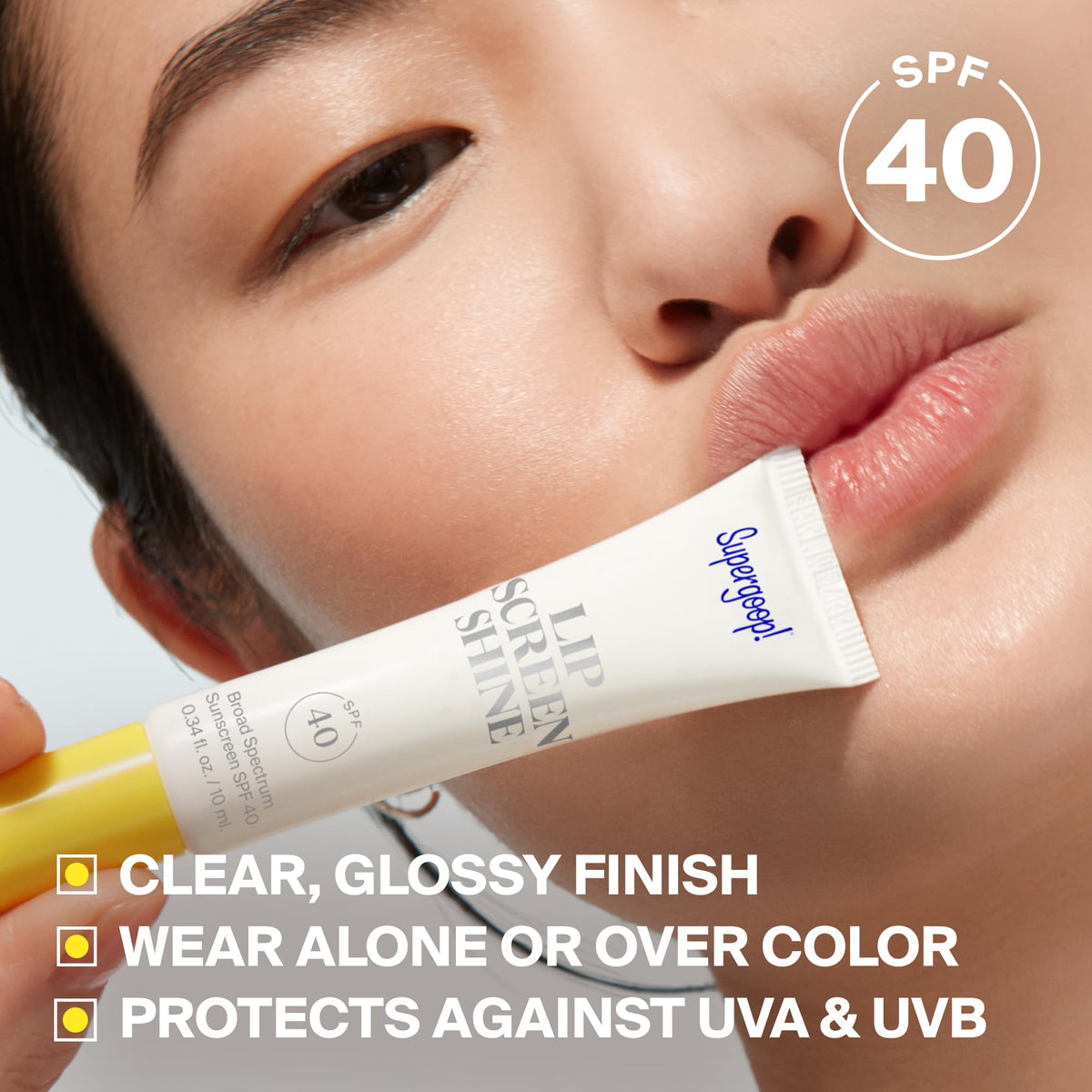 Supergoop! Lipscreen Shine SPF 40 clear lip gloss application on lips