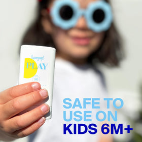 Supergoop! PLAY Mineral Stick SPF 50 in beach setting