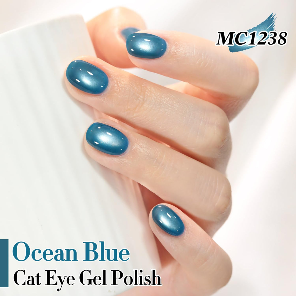 Swatch of Double Rhythm Cat Eye Gel Polish Ocean Blue on nail