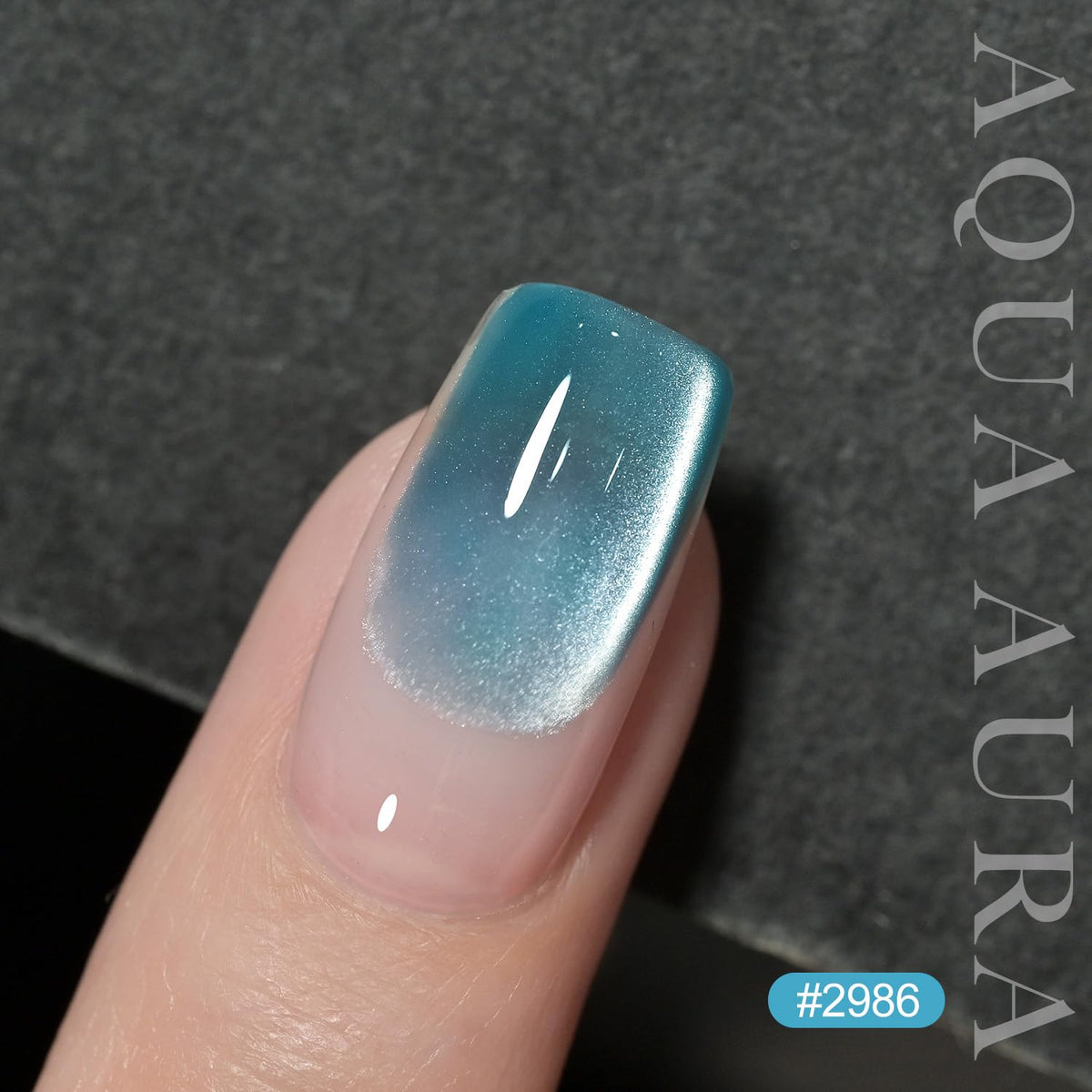 Swatch of GAOY Jelly Blue Cat Eye Gel Nail Polish on nails