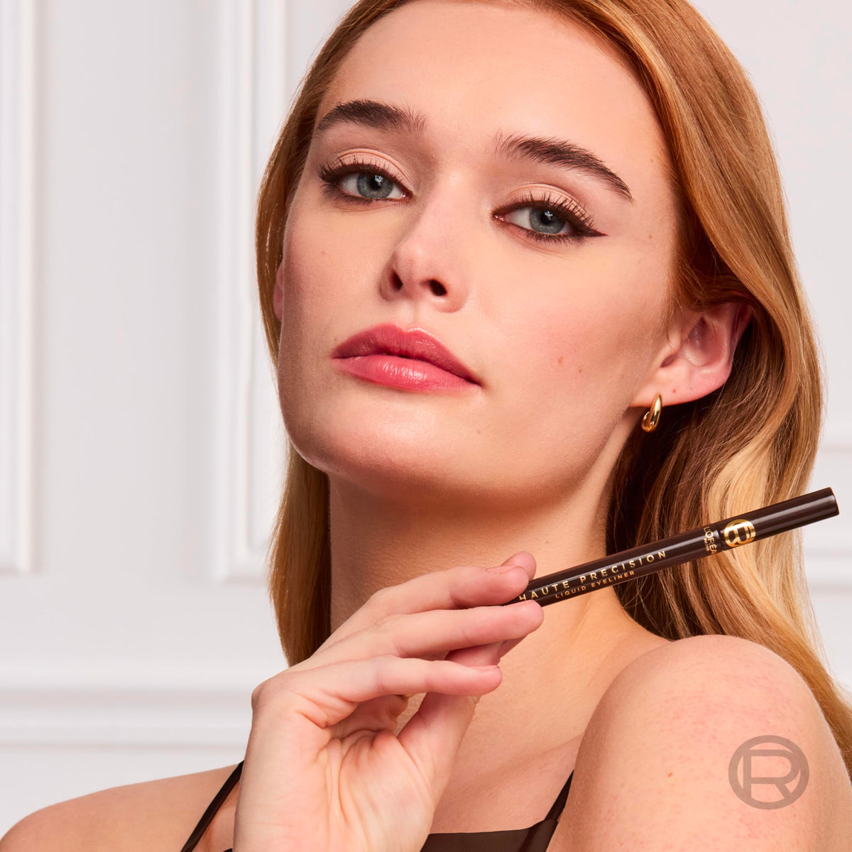 Swatch of L'Oreal Paris Waterproof Liquid Eyeliner in 020 Brown Leather on skin