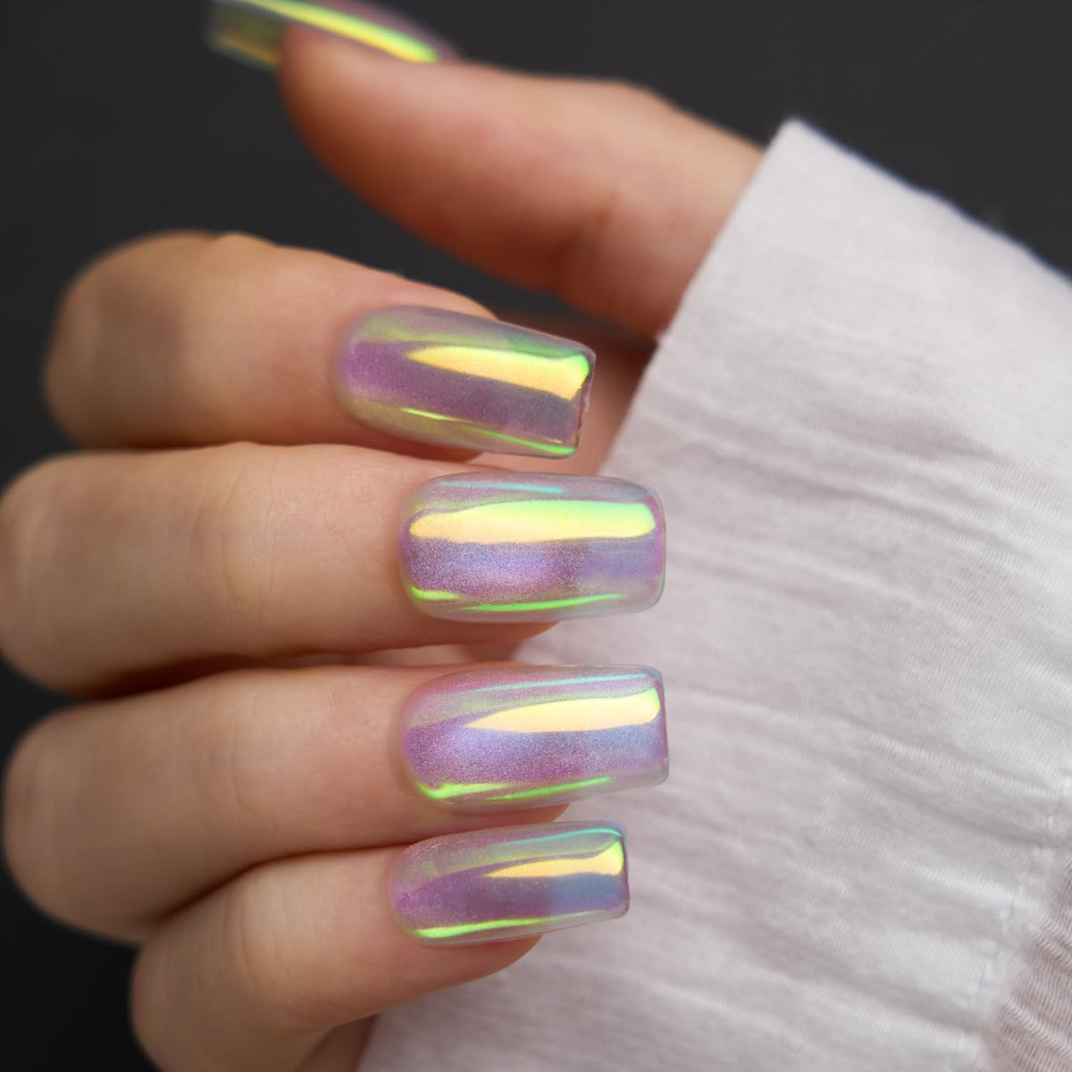 Swatch of Pretty Diva Aurora Chrome Nail Powder on nails