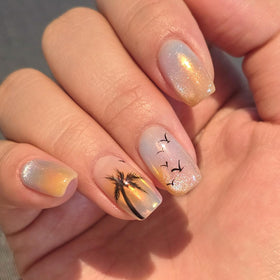 Swatch of Pretty Diva Sunset Chrome Nail Powder on nail