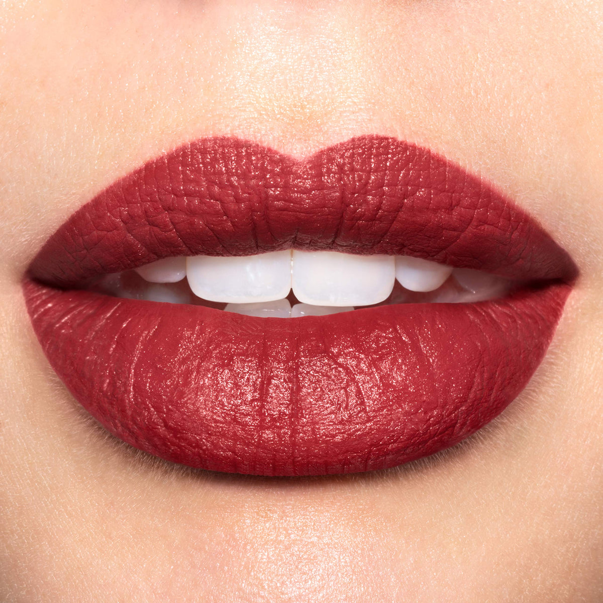 Swatch of REVLON Super Lustrous Luscious Mattes Lipstick Getting Serious on skin