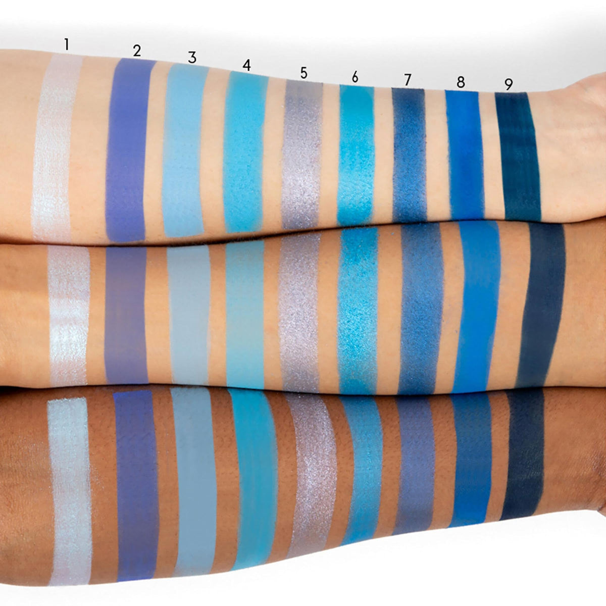 Swatches of ColourPop Blue Moon Eyeshadow Palette on skin