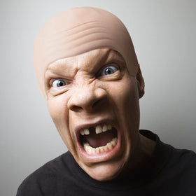 Syhood bald cap in use during a Halloween costume