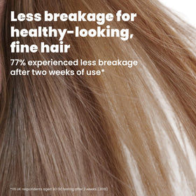 TANGLE TEEZER Fine Ultimate Detangler Brush on a bathroom counter