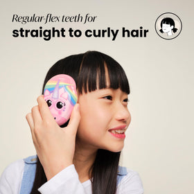 TANGLE TEEZER Mini Detangler Hair Brush for Kids in a child's hand