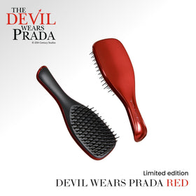 TANGLE TEEZER Mini Hair Brush Devil Wears Prada Red on a bathroom counter