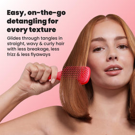 TANGLE TEEZER Mini Hair Brush Pink Punch in use by a child
