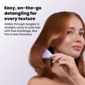TANGLE TEEZER Mini Hair Brush Wisteria Leaf on a bathroom counter