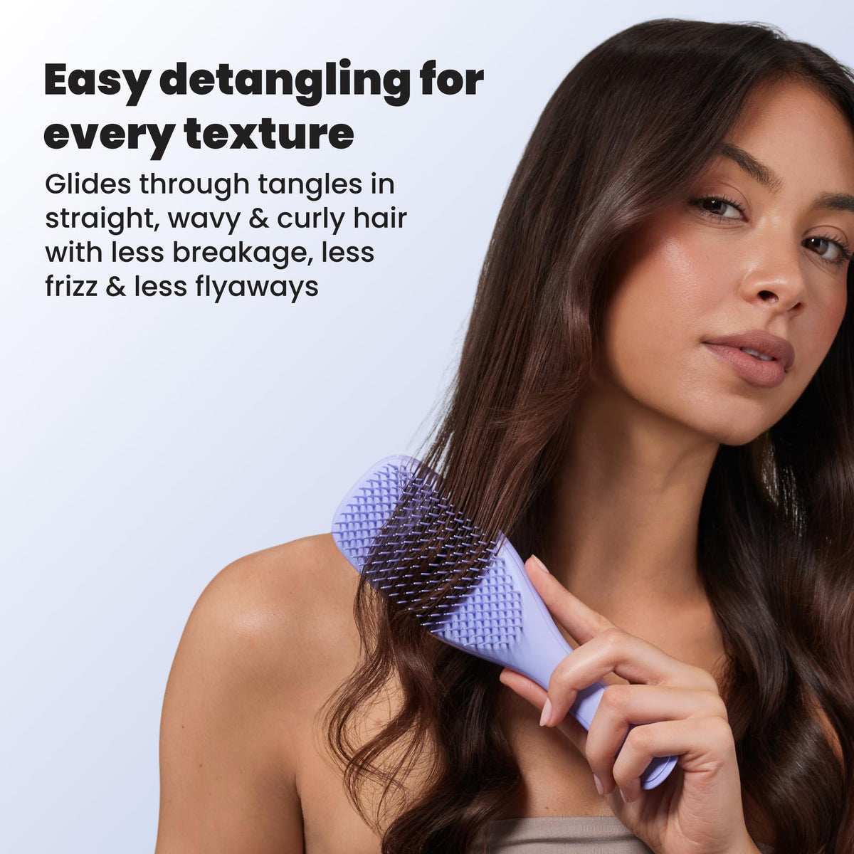 TANGLE TEEZER Ultimate Detangler Brush in a bathroom setting